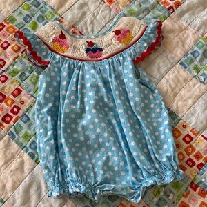 Blue Polka Dot Baby Romper with Smocked Cupcake Detail